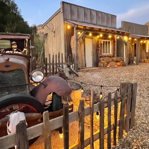 a truck that is sitting in front of a building