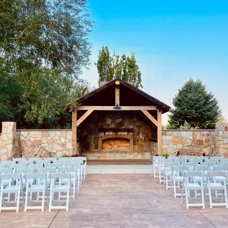 a wooden bench in front of a building