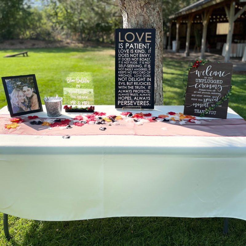 a laptop computer sitting on top of a table